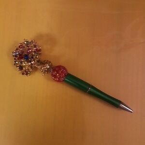Green Jeweled Ballpoint Pen with Red and Gold Tree Accents